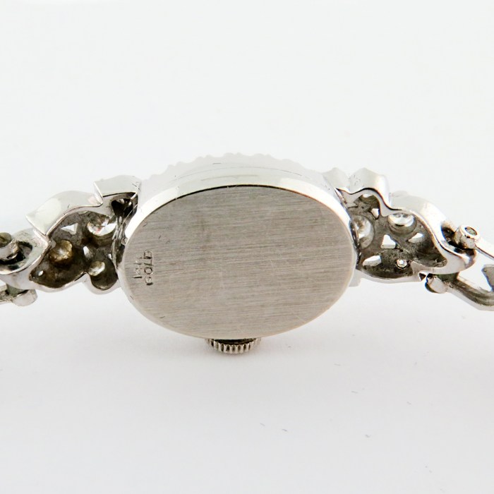 Omega Vintage Ladies Cocktail Watch Fully Embellished with Diamonds in 14K White Gold. Entire Row of Diamonds on Bracelet, 1940s, Approximately 1ctw