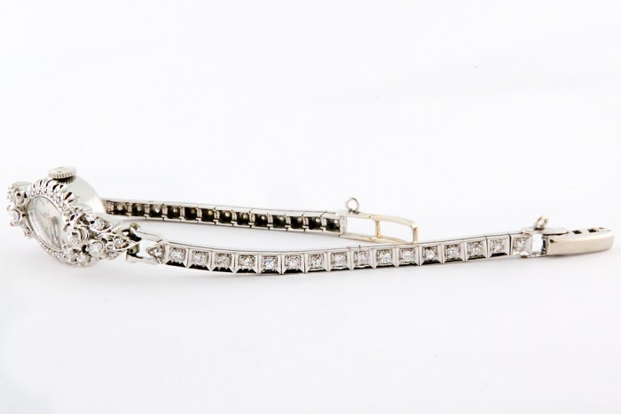 Omega Vintage Ladies Cocktail Watch Fully Embellished with Diamonds in 14K White Gold. Entire Row of Diamonds on Bracelet, 1940s, Approximately 1ctw