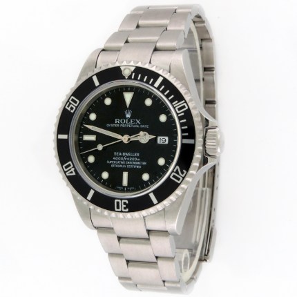 Rolex Sea-Dweller 4000ft Water Resistant Mens Divers Wristwatch. Reference 16600 with no holes on the lugs. It is a very good condition watch with Full Set original Rolex Boxes and All Accessories including Original Warranty Card, Chronometer Certification Pamphlet, Submariner Booklet, Factory Service Booklet, Diving Card, and even the Sizing Tool.