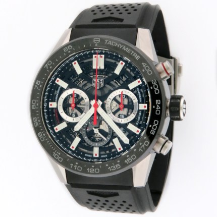 TAG Heuer Carrera Automatic Chronograph Skeletonized Dial with Ceramic Bezel. 45mm Diameter, on Rubber Strap and Stainless Steel Deployant Buckle. Model Reference CBG2A10. Retail Price $6,600.