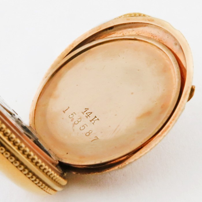 LADY ELGIN 14K 27mm Open Face Ladies High Relief Extra Fancy Floral Pendant Watch Yellow Gold Grade 255 Size 10/0. One of the fanciest Pendant Watches.