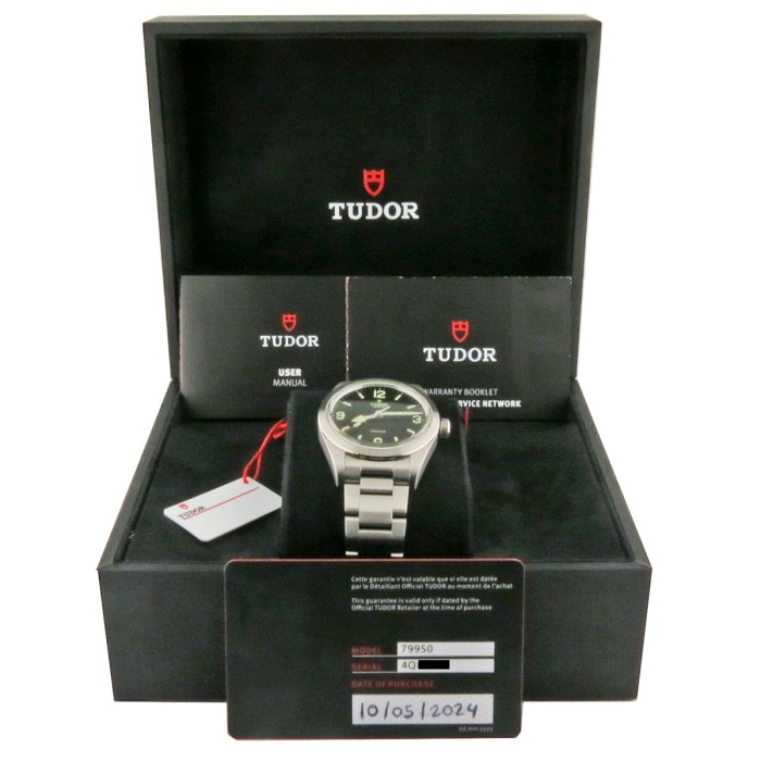 TUDOR Mens SS Ranger Automatic Bracelet Master Black Dial Stainless Steel 39mm. Reference M79950-0001. With Box and Paper. MSRP Retail Price $3575