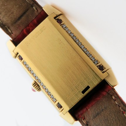 Jaeger-LeCoultre Ref 265.1.86 18K Yellow Gold Reverso 'Joaillerie' Diamond & Ruby Ladies Watch. 20.5x33mm. Mechanical Hand Wind with 18KY Buckle and Box