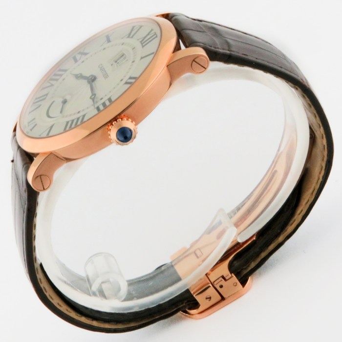 Cartier Rotonde 18K Rose Gold Hand-Wind Mens Wristwatch with Power Reserve Indicator at 40mm. Model Ref W1556252 and the Case Ref 3732. Retail Price $26000