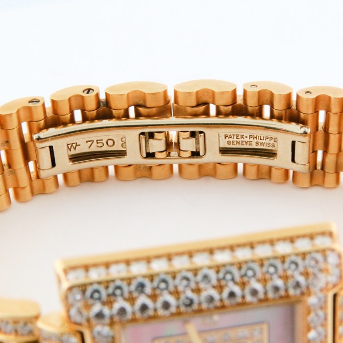 Superb Patek Philippe Ladies 'Gondolo' 18K Solid Yellow Gold Bracelet Ladies Wristwatch with Factory-Set Diamonds. Ref.4874/3J. 22.5 x 23.5mm. MSRP $47,600.