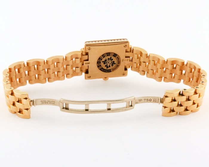Superb Patek Philippe Ladies 'Gondolo' 18K Solid Yellow Gold Bracelet Ladies Wristwatch with Factory-Set Diamonds. Ref.4874/3J. 22.5 x 23.5mm. MSRP $47,600.