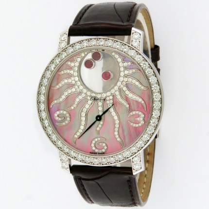 Chopard Ladies Happy Diamonds 'Happy Sun' 18K White Gold 3ct Factory Diamonds & Floating Rubies Ladies Wristwatch Ref.207469 / 207470 40mm. MSRP $56,600.