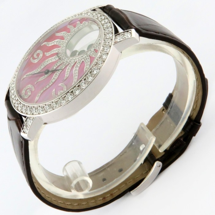 Chopard Ladies Happy Diamonds 'Happy Sun' 18K White Gold 3ct Factory Diamonds & Floating Rubies Ladies Wristwatch Ref.207469 / 207470 40mm. MSRP $56,600.