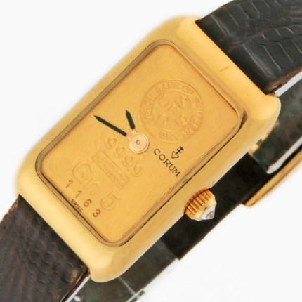 Corum 5 Gram Ingot Ladies Watch with Mechanical Movement. Corum Ingot watches from the 1970-80s using a 24K pure gold ingot plaque as the dial. All original.