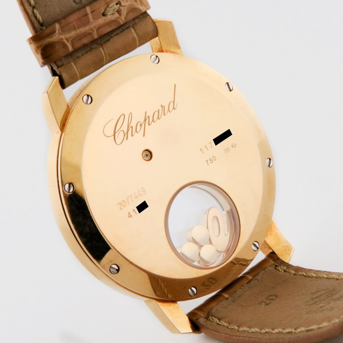 Chopard Ladies Happy Diamonds 18K Yellow Gold Factory Floating Diamonds Ladies Wristwatch Ref.207449 40mm. MSRP $14,650.