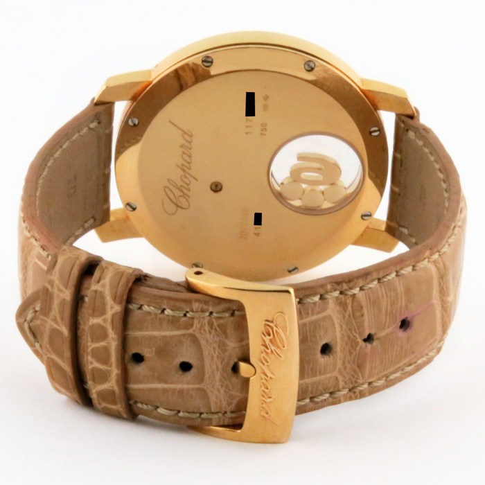 Chopard Ladies Happy Diamonds 18K Yellow Gold Factory Floating Diamonds Ladies Wristwatch Ref.207449 40mm. MSRP $14,650.