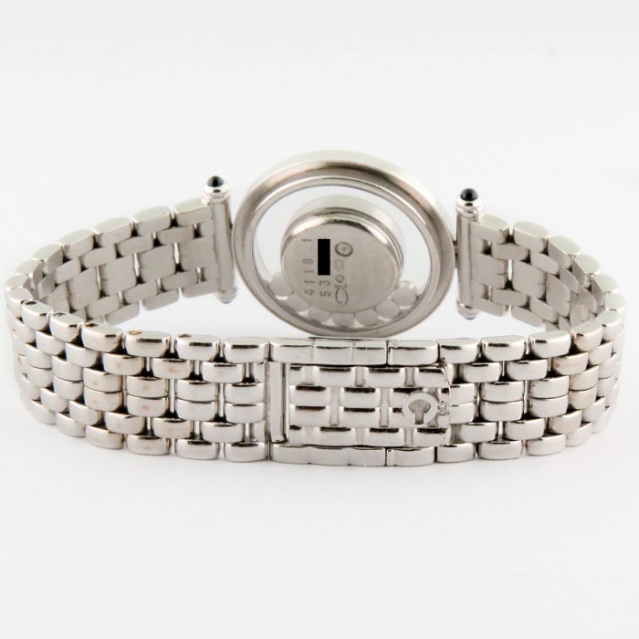 Chopard Ladies Happy Diamonds with 7 Floating Diamonds and Fully Diamond Set Bezels. 18K White Gold Bracelet Ladies Wristwatch Ref.204993 25mm. MSRP $24,370