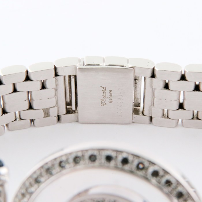 Chopard Ladies Happy Diamonds with 7 Floating Diamonds and Fully Diamond Set Bezels. 18K White Gold Bracelet Ladies Wristwatch Ref.204993 25mm. MSRP $24,370