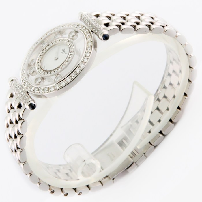 Chopard Ladies Happy Diamonds with 7 Floating Diamonds and Fully Diamond Set Bezels. 18K White Gold Bracelet Ladies Wristwatch Ref.204993 25mm. MSRP $24,370