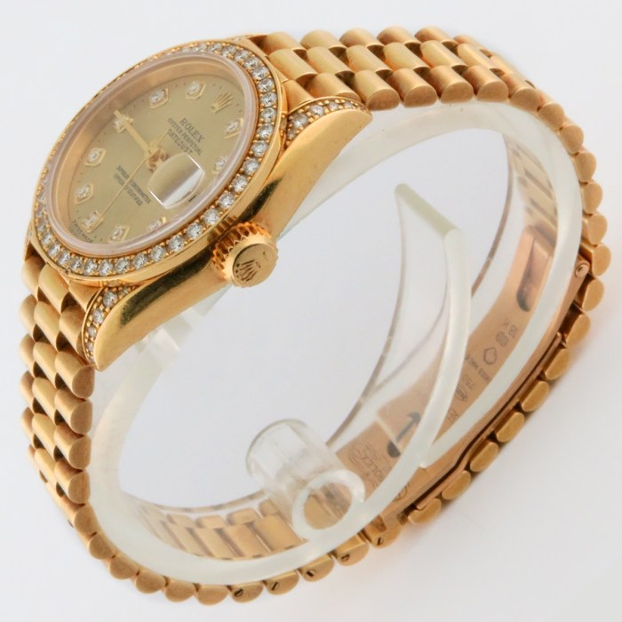 Rolex Lady Datejust President 69158 with Factory Diamond Markers/Bezel/Lugs in 18K Yellow Gold. Box & Pamphlet, Circa 1995. Diameter 26mm.