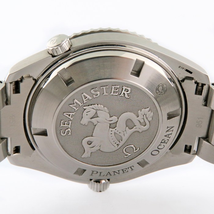 Back of an Omega Seamaster Planet Ocean watch showing the engraved logo and text on the case back (SEAMASTER, PLANET OCEAN).