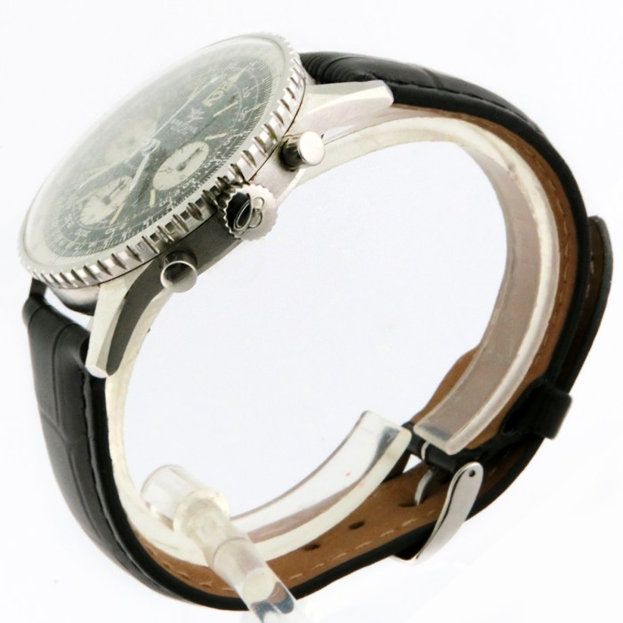 Side view of a silver chronograph wristwatch with a black leather strap and knurled crown, showing the case and pushers.