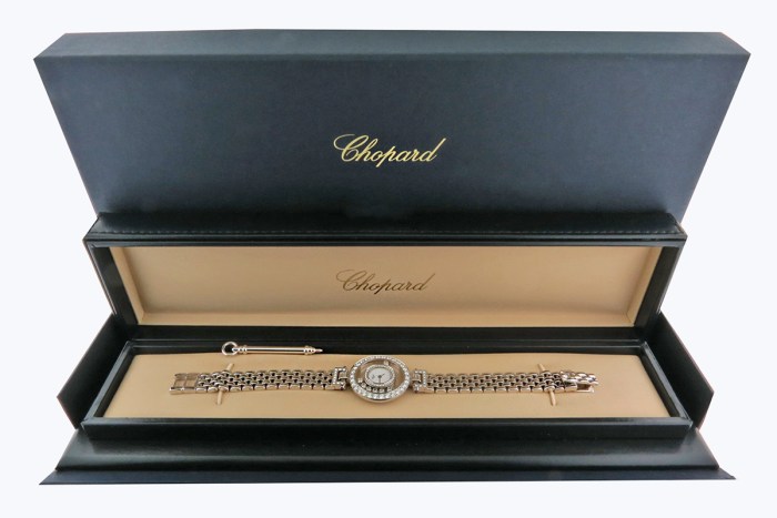 Chopard Ladies Happy Diamonds with 7 Floating Diamonds and Fully Diamond Set Bezels. 18K White Gold Bracelet Ladies Wristwatch Ref.204846 26mm. MSRP $26,590