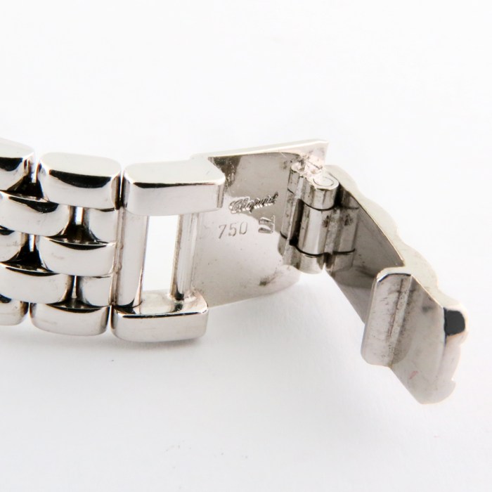 Chopard Ladies Happy Diamonds with 7 Floating Diamonds and Fully Diamond Set Bezels. 18K White Gold Bracelet Ladies Wristwatch Ref.204846 26mm. MSRP $26,590
