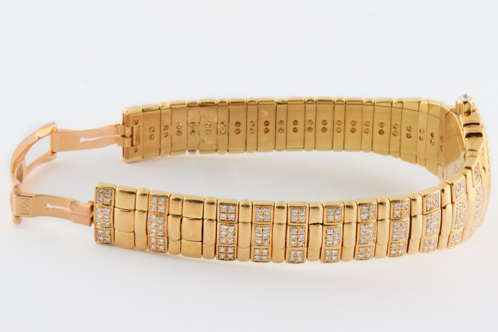 Top luxury watch Piaget Tanagra Ladies 18K Yellow Gold Watch with full PAVE factory diamond & ruby dial. Ref.16037 M 406 D. 25mm MSRP $68,780